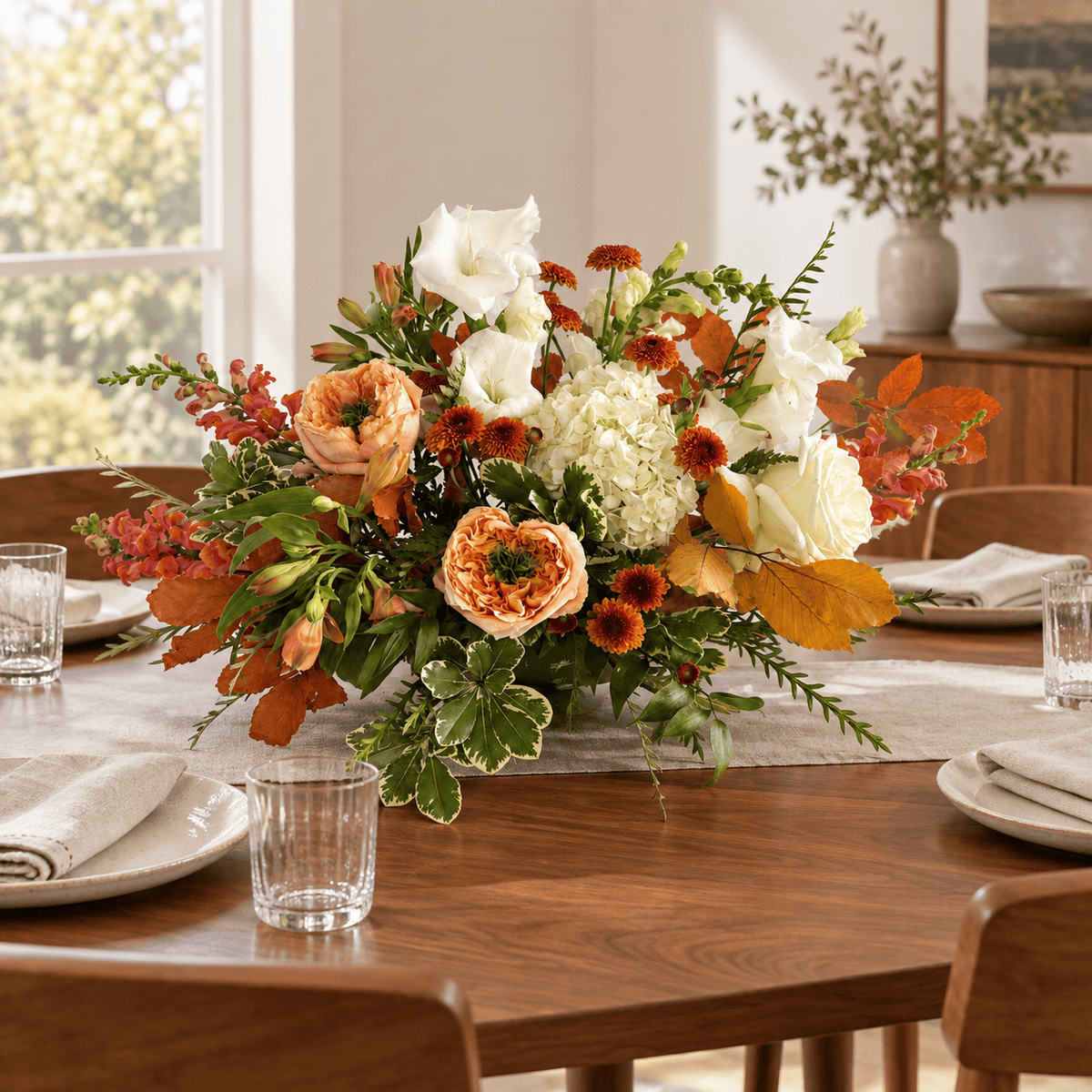 Thanksgiving centerpiece on a mid-century dining table